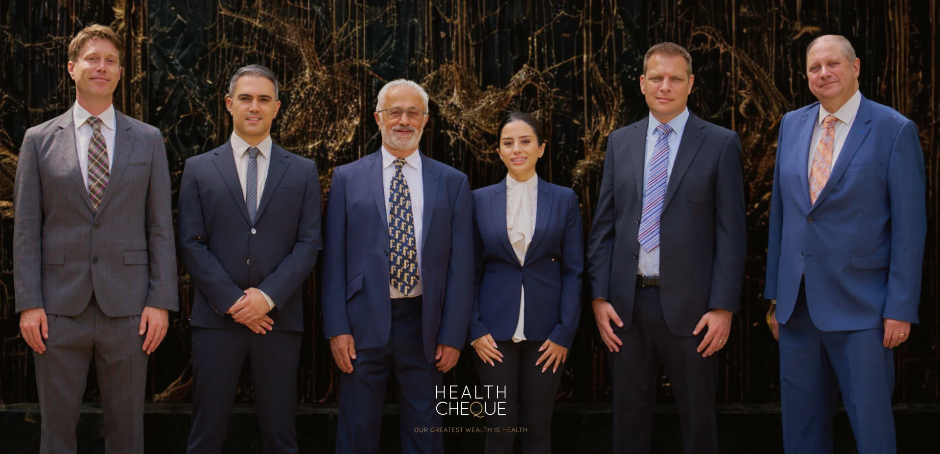 Team of experienced private medical insurance advisors standing together, representing trusted support and expert healthcare guidance.
