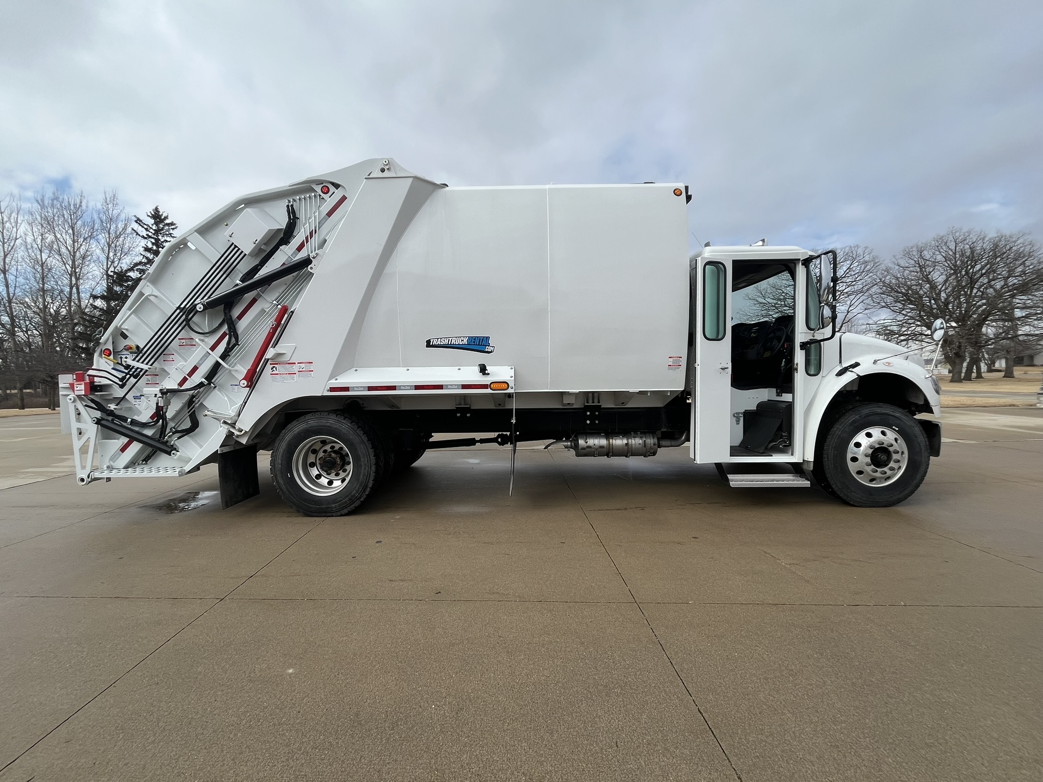 2024 Freightliner M2 Pac-Tech rear load garbage truck side profile#1.3