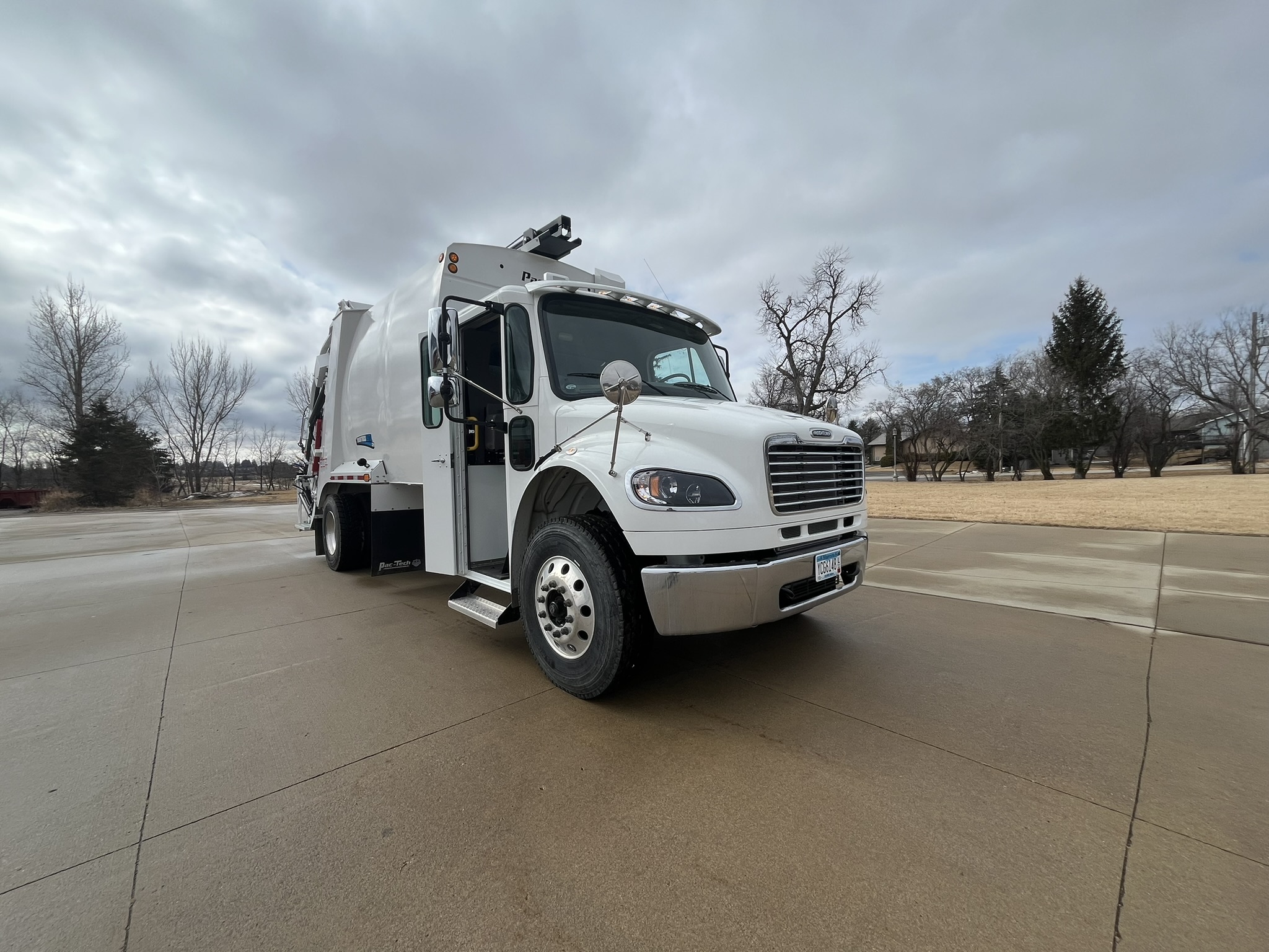 2024 Freightliner M2 Pac-Tech rear load garbage truck front view#1.3