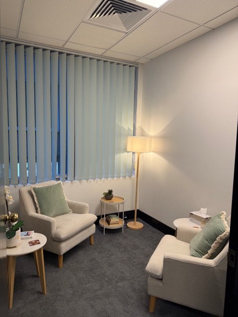 Room 2, two armchairs and side table