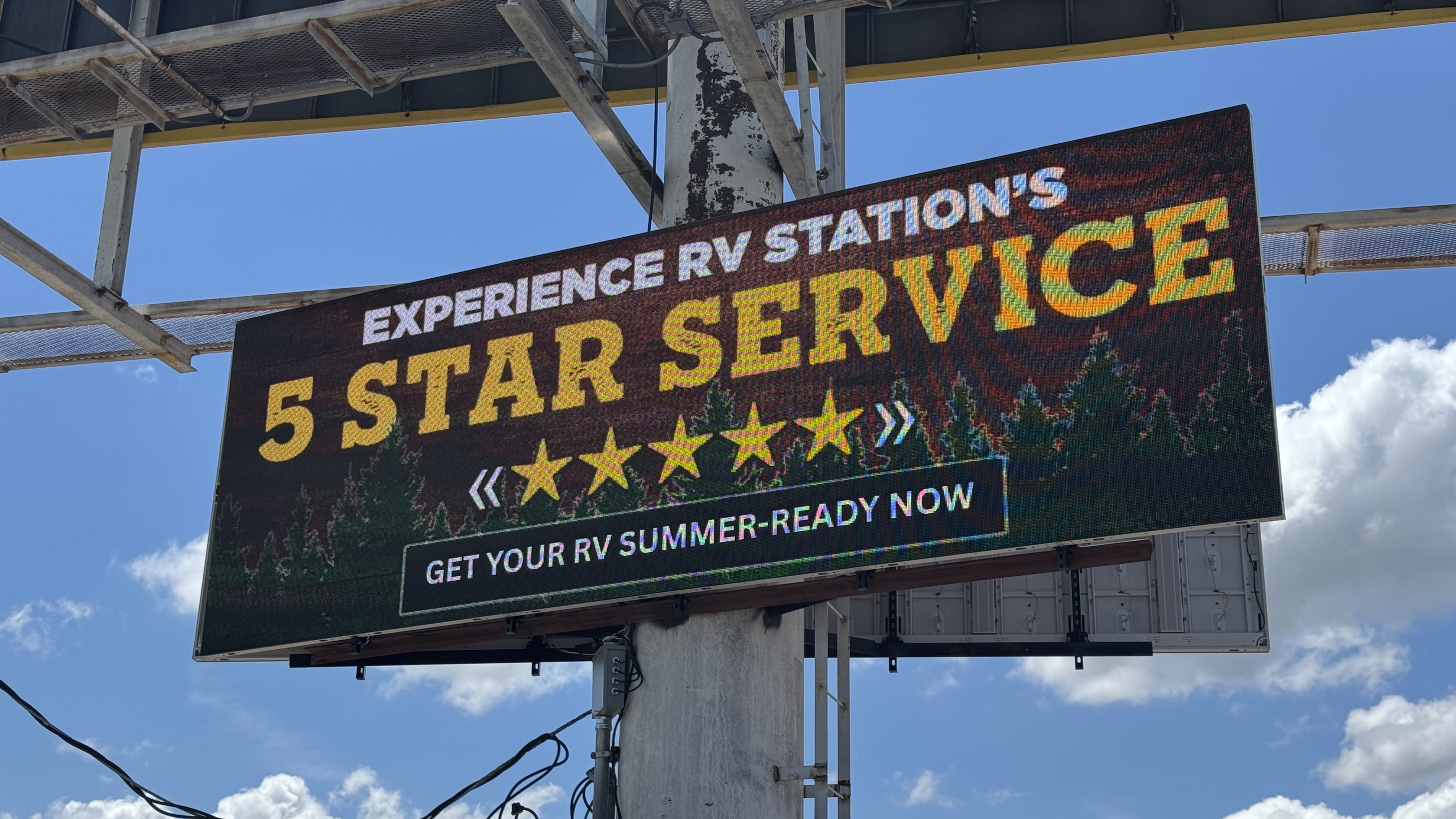 Close-up of RV Station’s double-sided outdoor LED sign on I-35 in Colbert, OK—P6.67 101OF panels promoting “5 Star Service.”