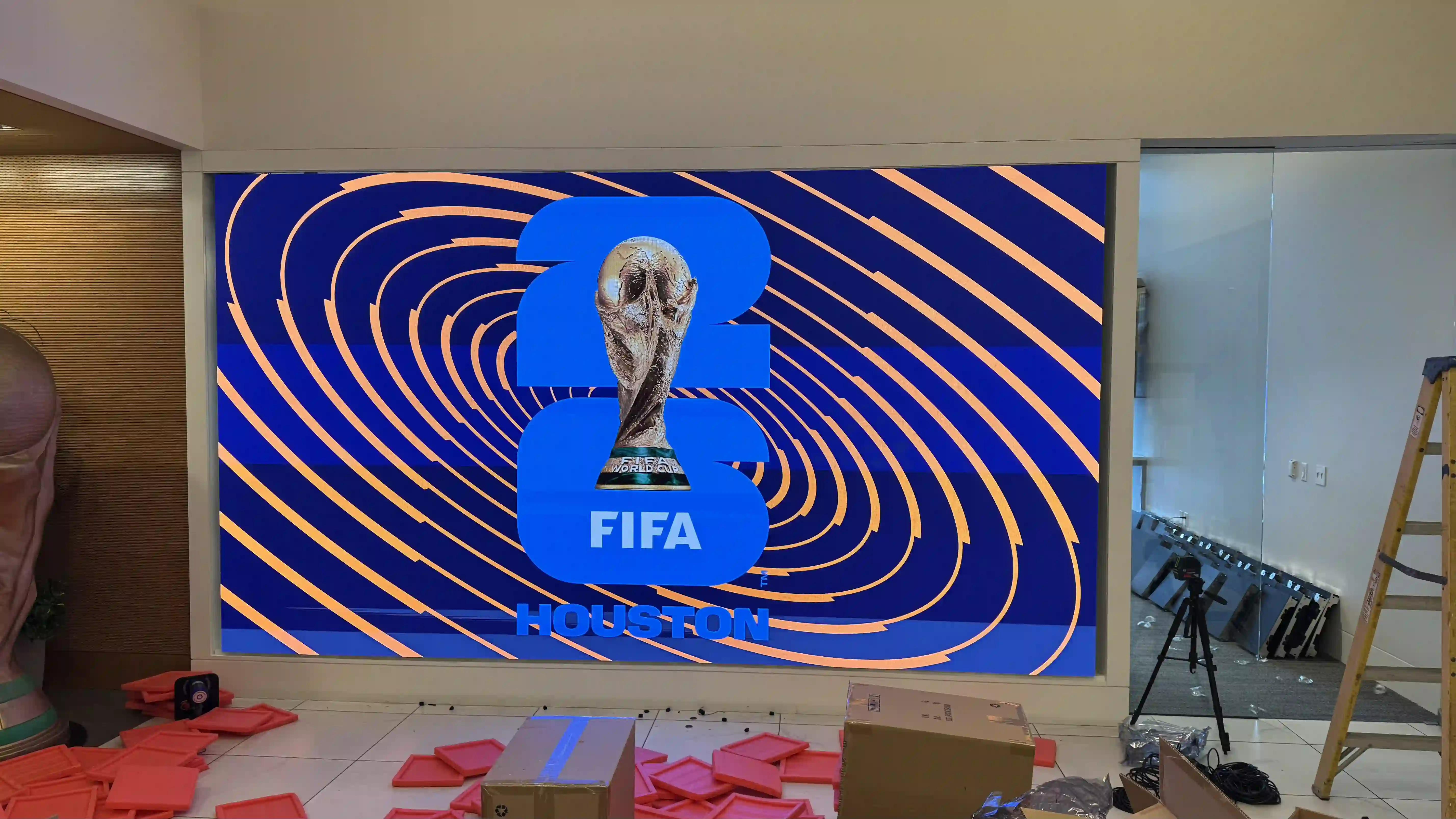 New P1.9 LED screen displaying FIFA Houston graphics during commissioning at Harris County Sports Authority’s office.