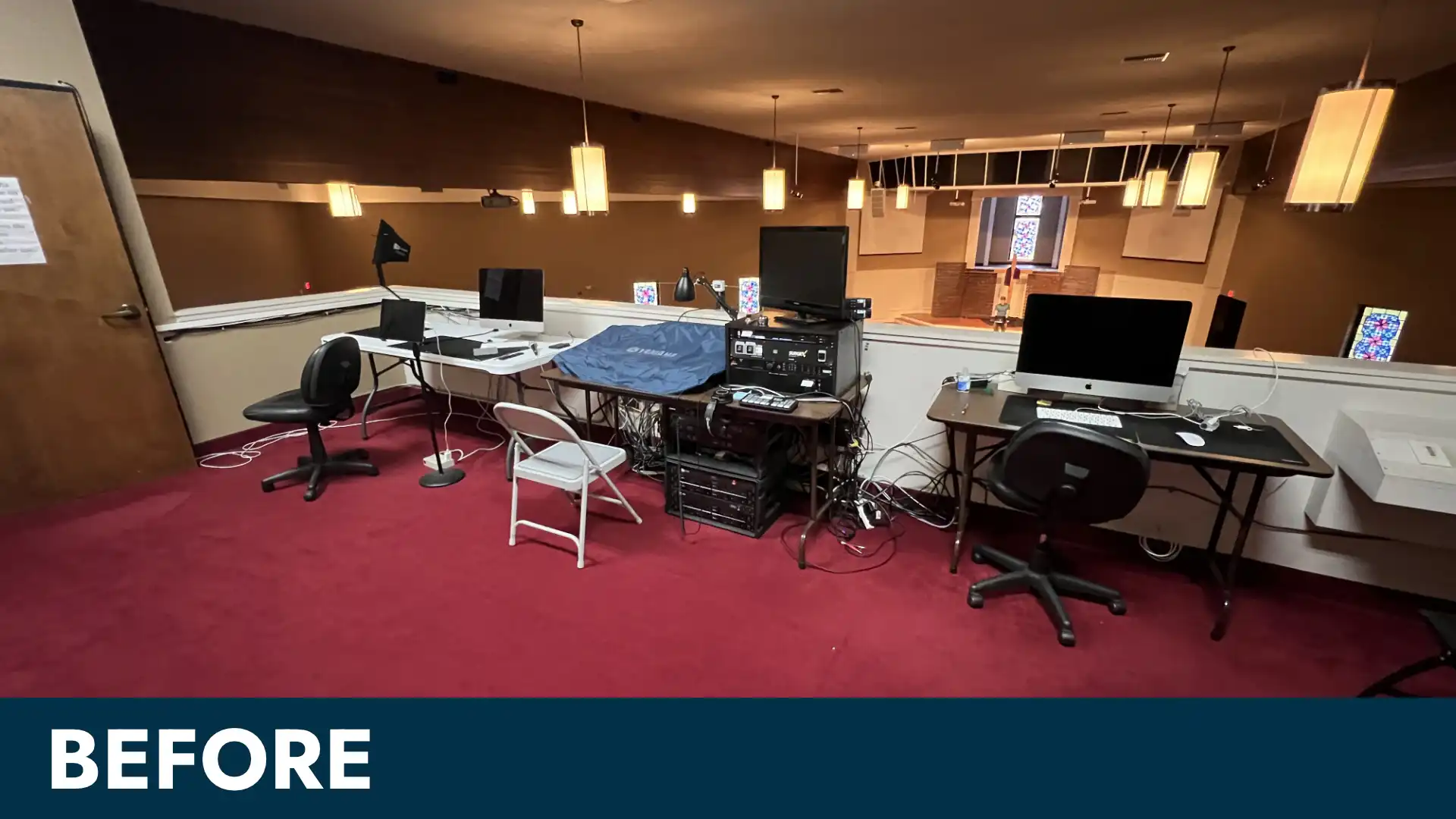 Before: disorganized control area with cables and equipment piles along back wall—pre-upgrade view before church AV/LED screen integration.