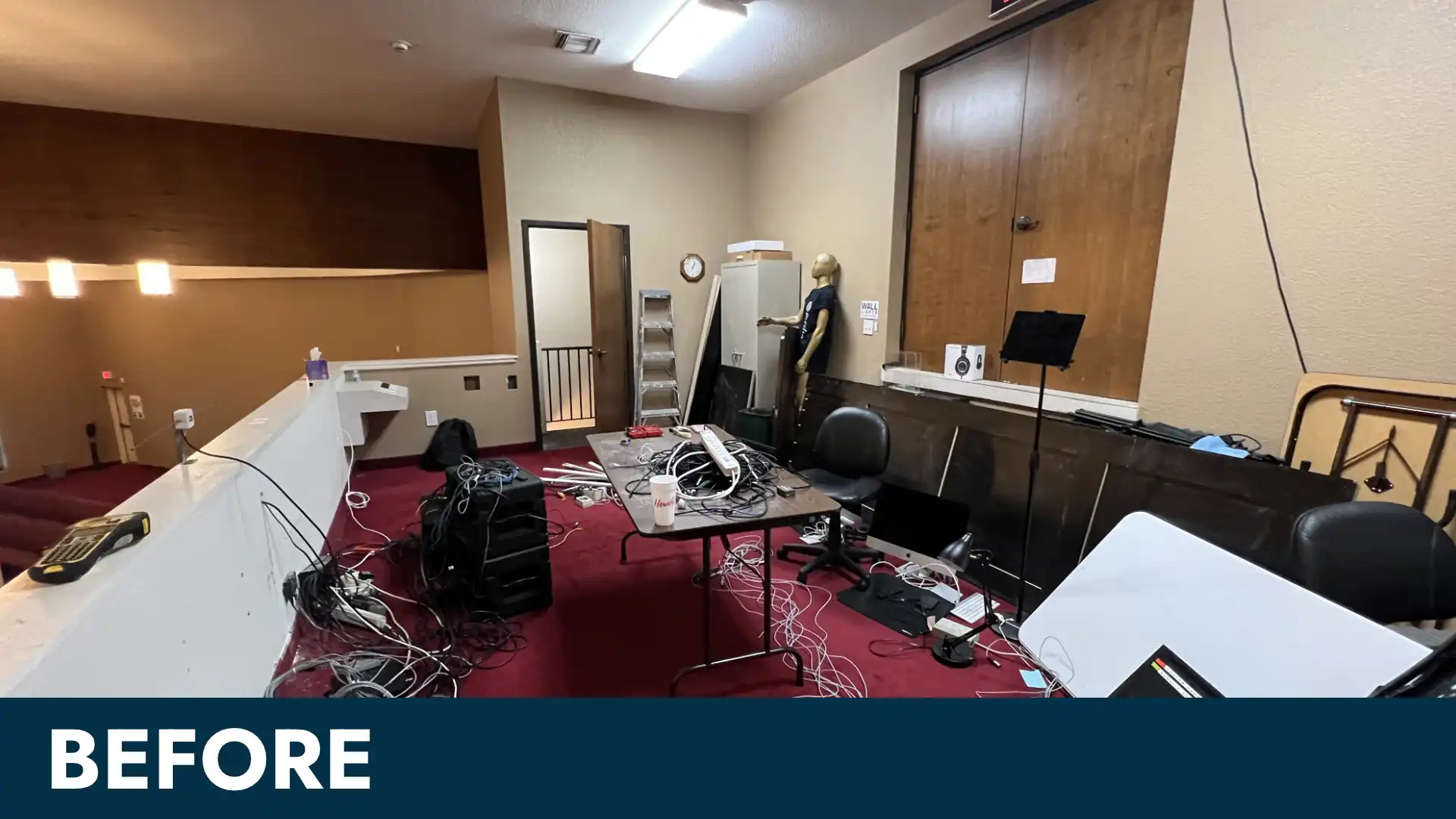 Before: cluttered church tech booth with folding tables, loose cables, and mismatched gear prior to LED video wall and AV system upgrade.