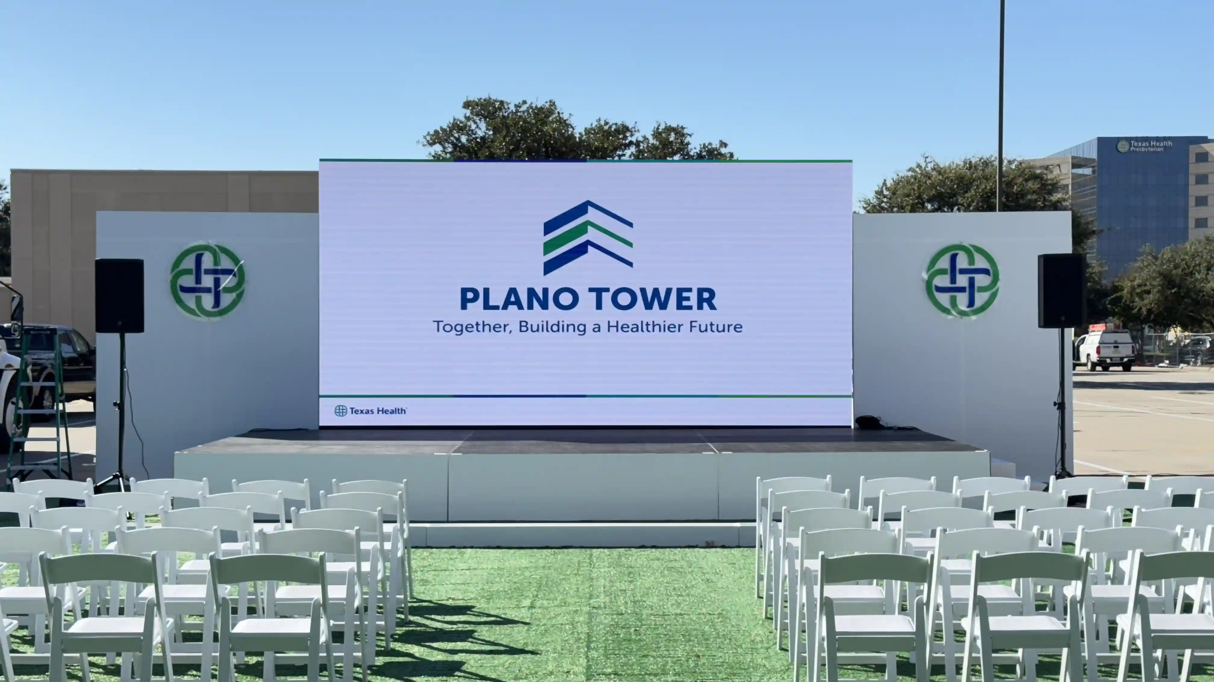 Large outdoor LED video wall rental used as the main stage backdrop for the Texas Health Plano Tower groundbreaking.