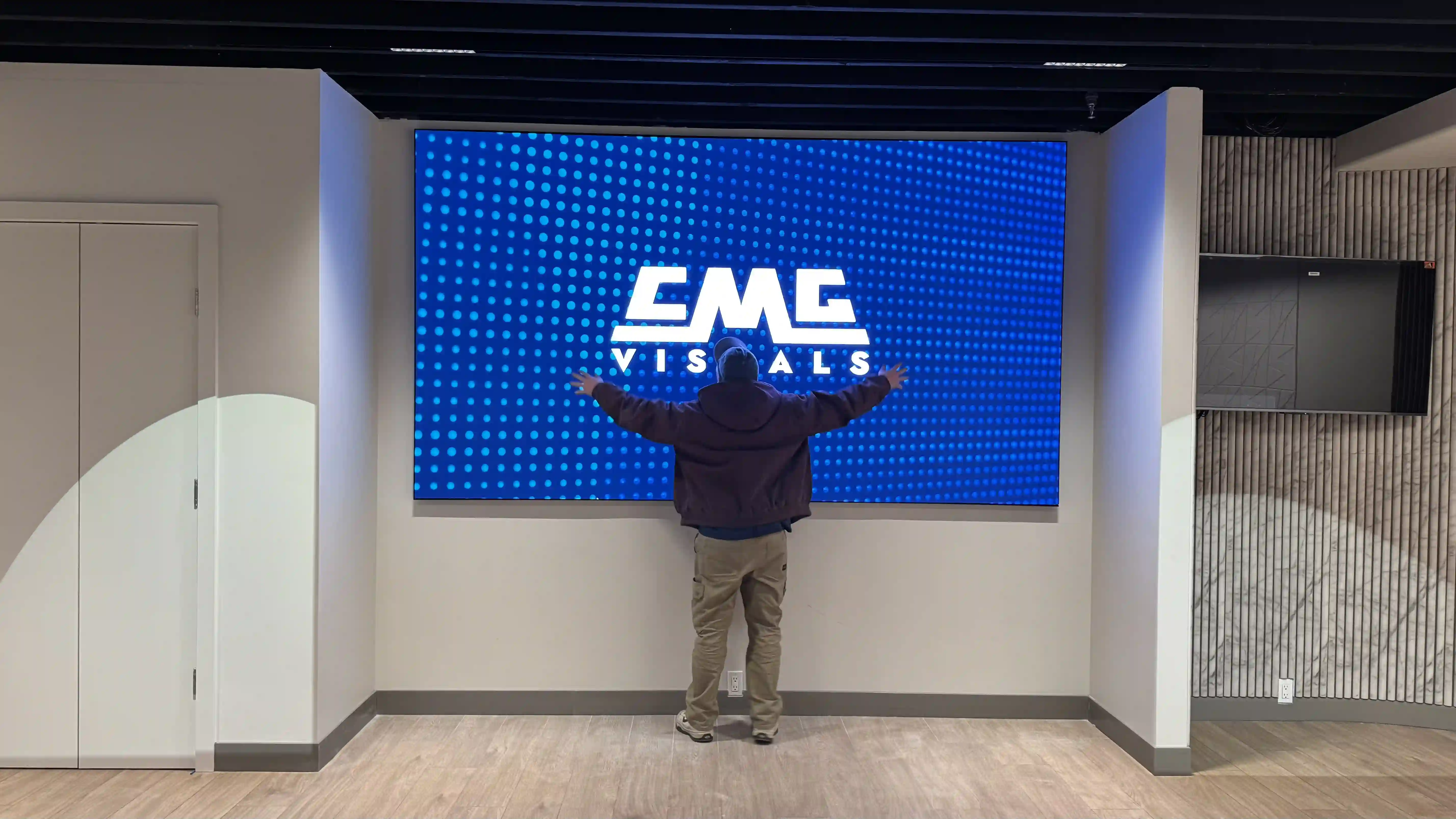 135” 0.9mm 4K LED video wall installation in Long Island NY corporate meeting room by CMG Visuals