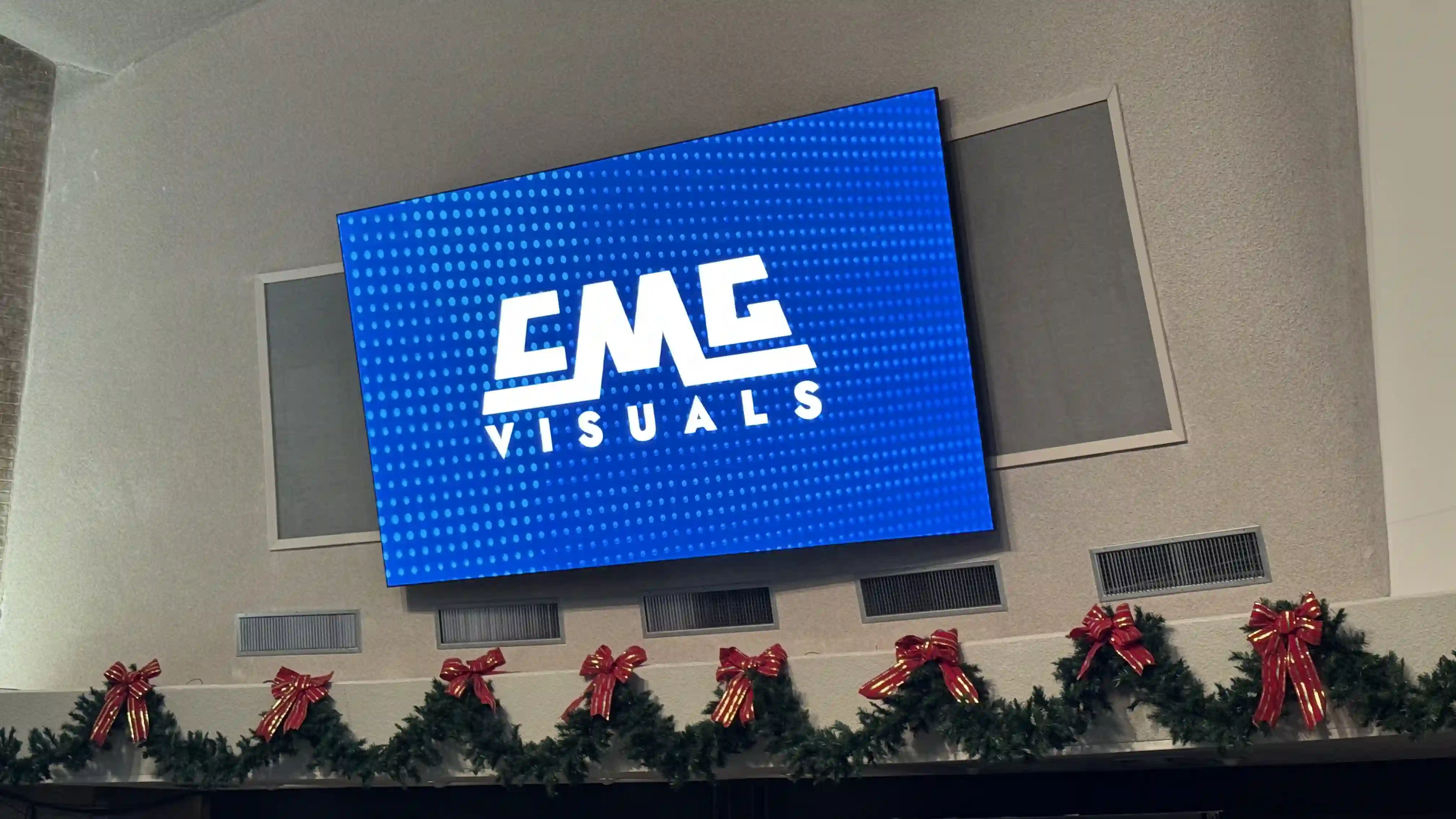 Wall-mounted LED video display screen installed in church interior