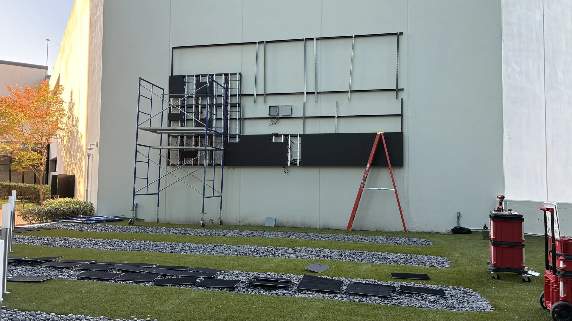 Mounting rails and frame installed for outdoor LED wall at UrbanTowers