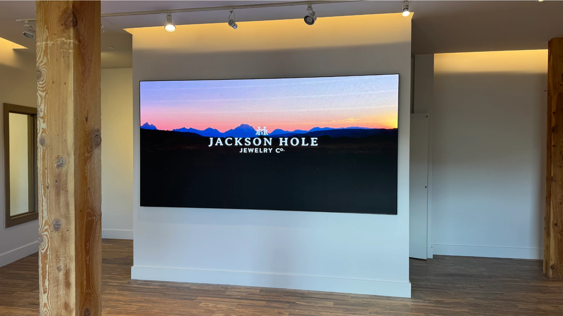 Retail LED video wall displaying Jackson Hole Jewelry branding