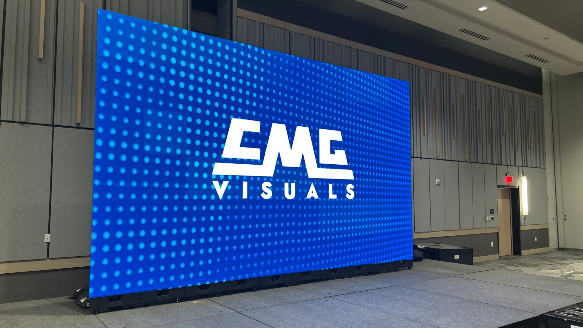 Large LED screen rental displaying CMG Visuals logo