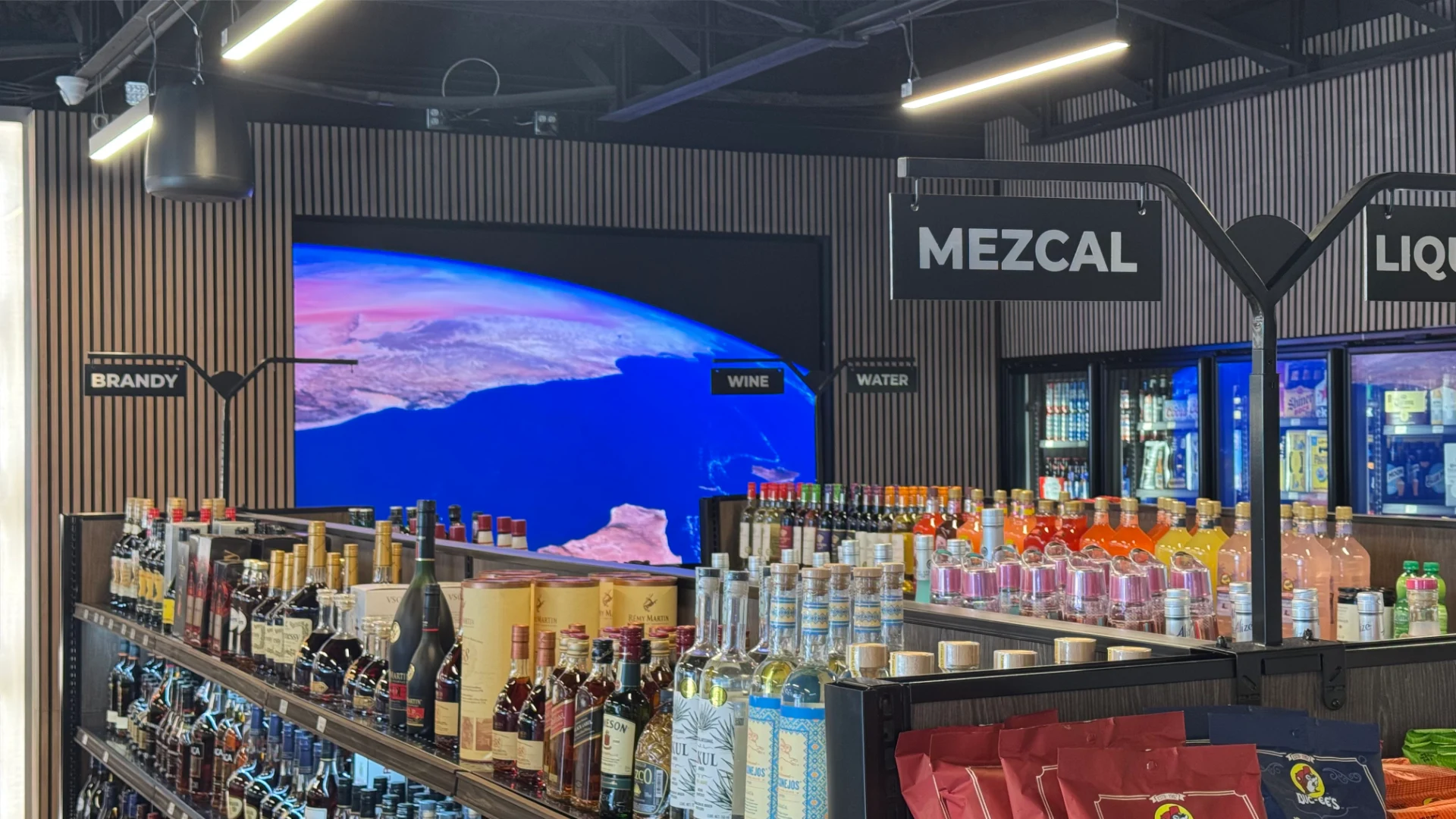LED screen installation in Bodega Fine Spirits liquor store