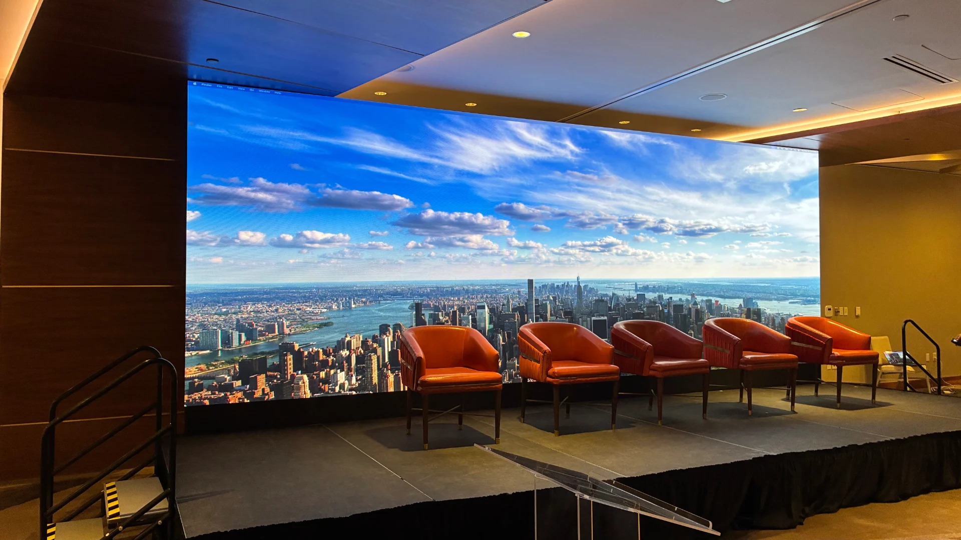 CMG Visuals indoor LED video wall and panel seating stage at a corporate event at The Statler Dallas.