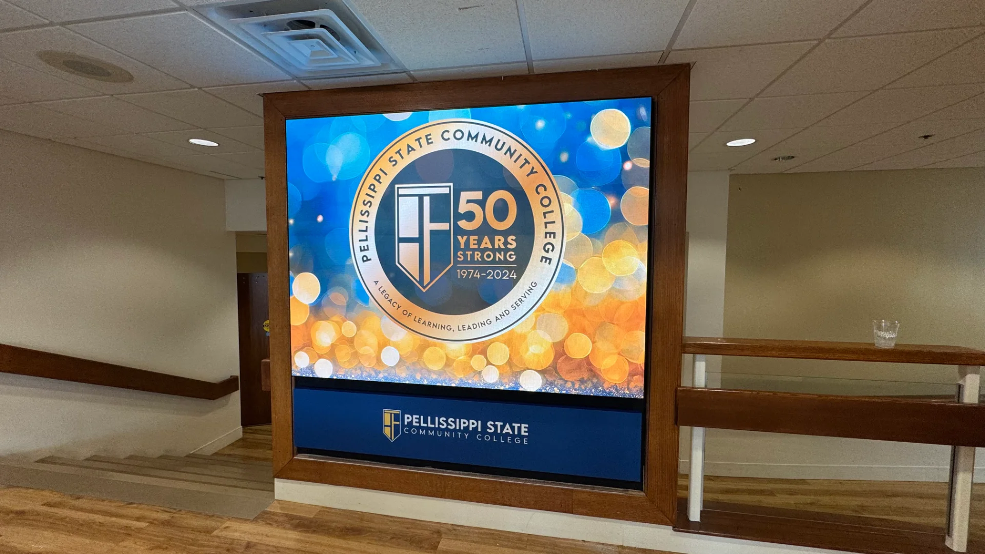 Permanent CMG Visuals LED display showing the Pellissippi State Community College 50th anniversary branding indoors.