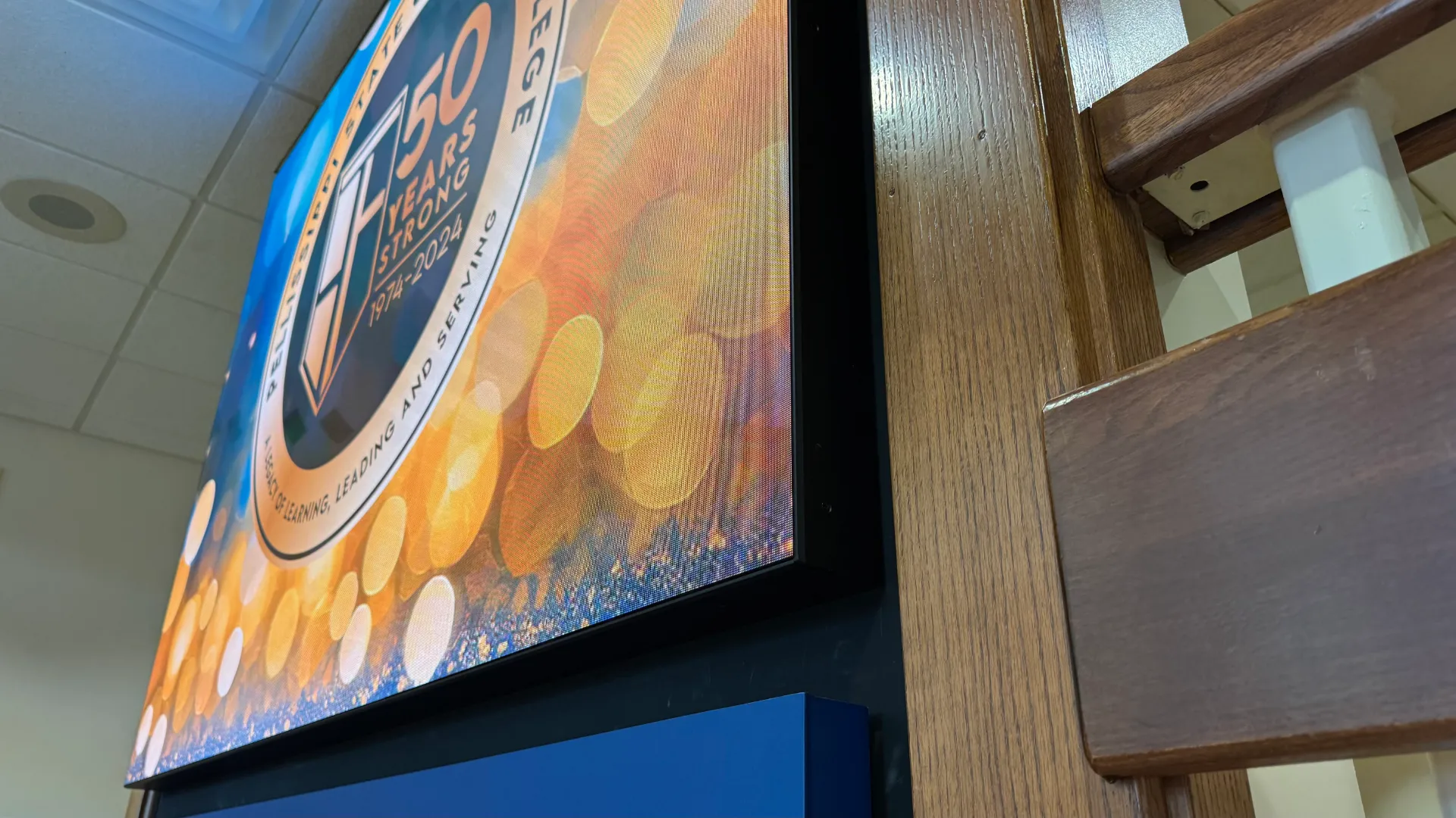 Close-up of the CMG Visuals LED wall edge and wood frame at Pellissippi State Community College. 