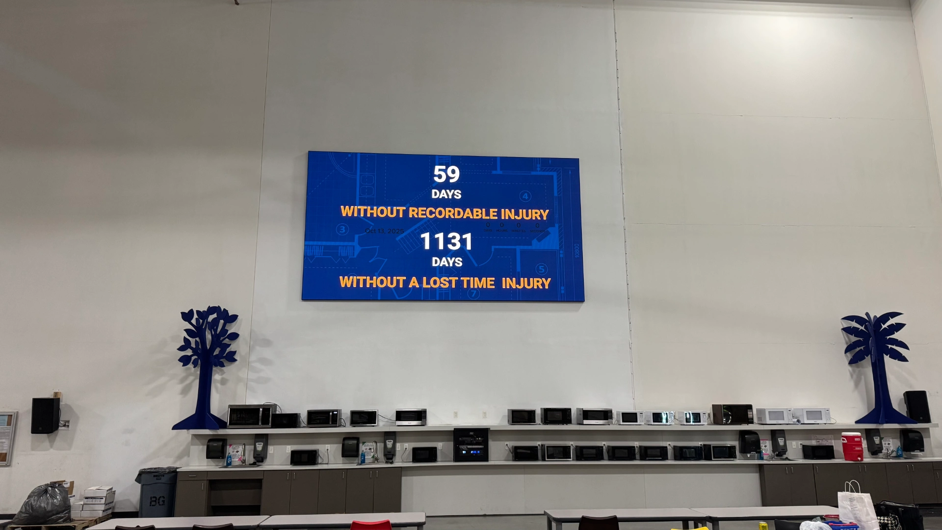 CMG Visuals indoor LED safety display mounted in the Smith System break area above the microwave counter.