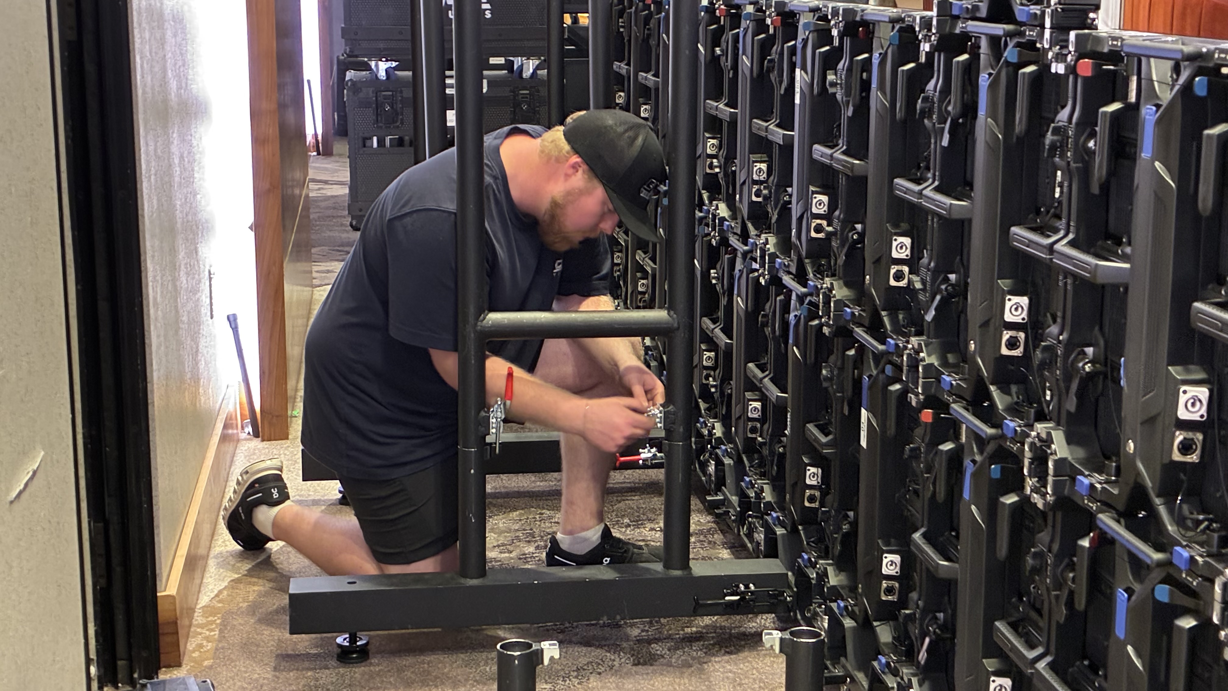 LED Technician is assembling LED ground support