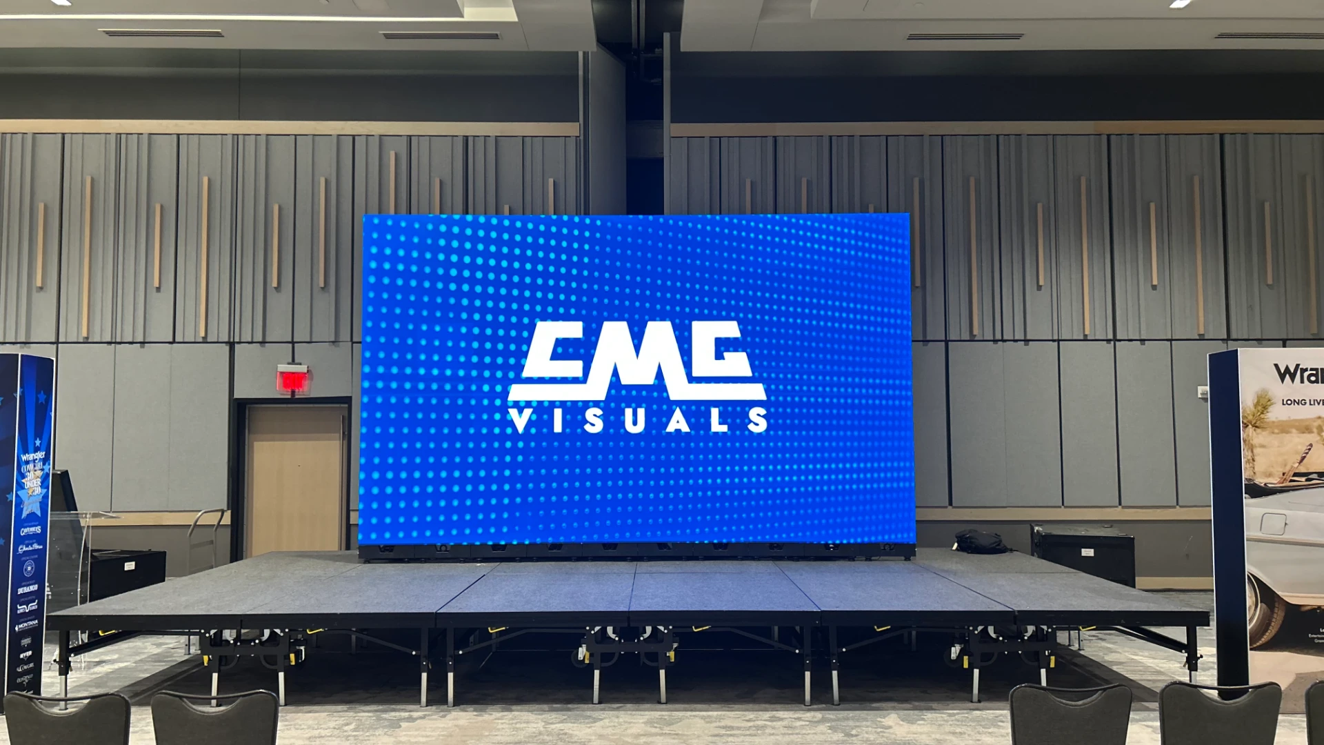 CMG Visuals LED video wall on a stage setup in an event space.