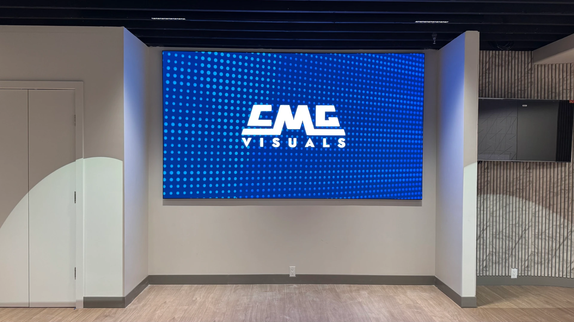 CMG Visuals indoor LED video wall lit up in a space.