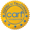 CARF Gold Seal of Accreditation emblem with stars and the words Aspire to Excellence.