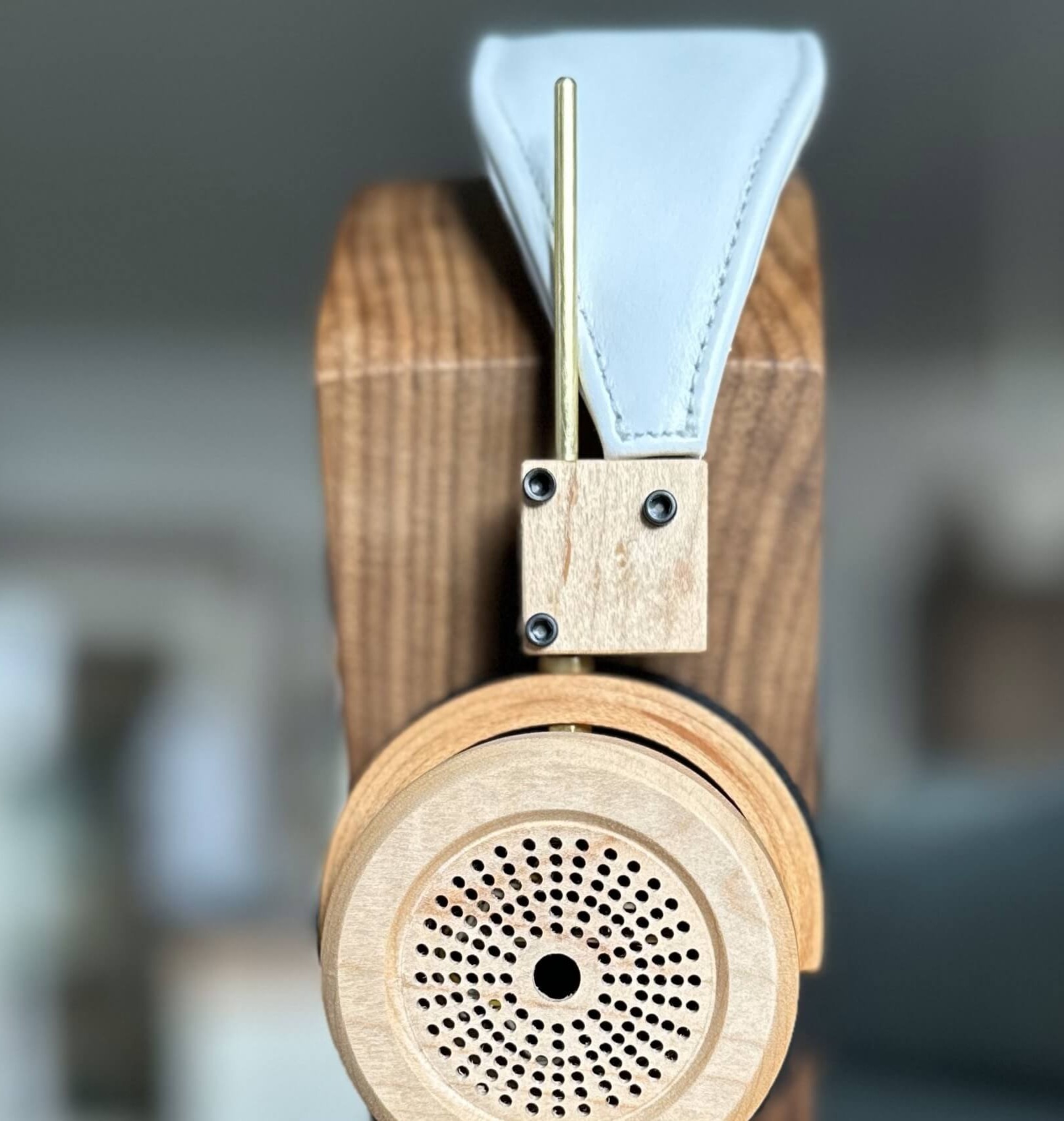 Mable and White Headband Open Back Headphone on walnut stand