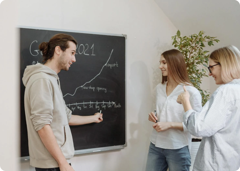 a man discusi with two wome