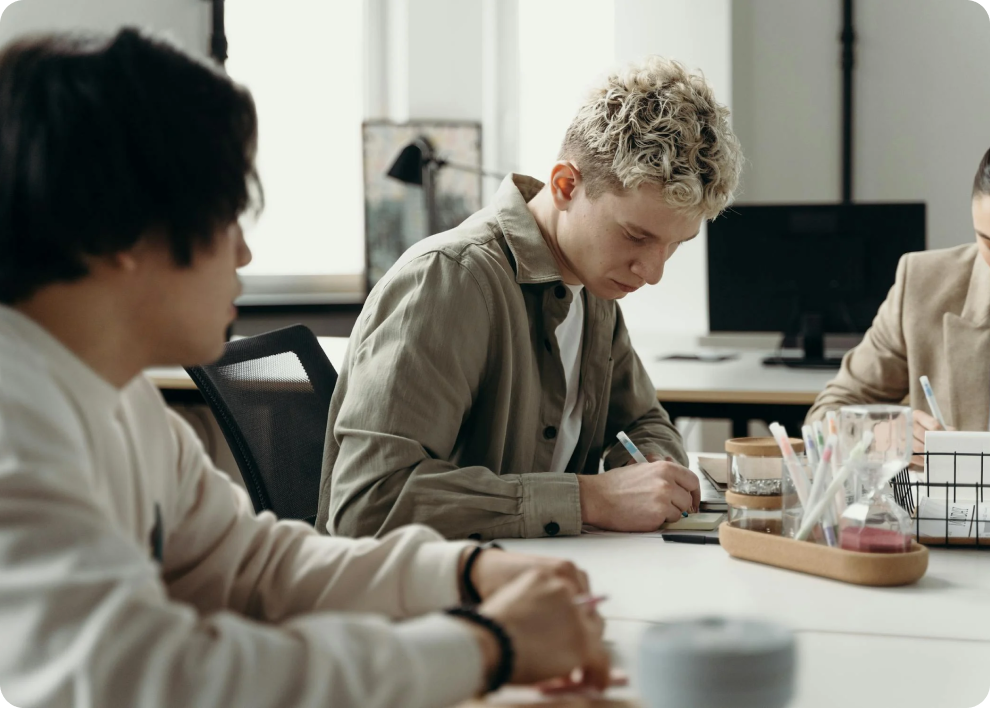 a man discusi with two women