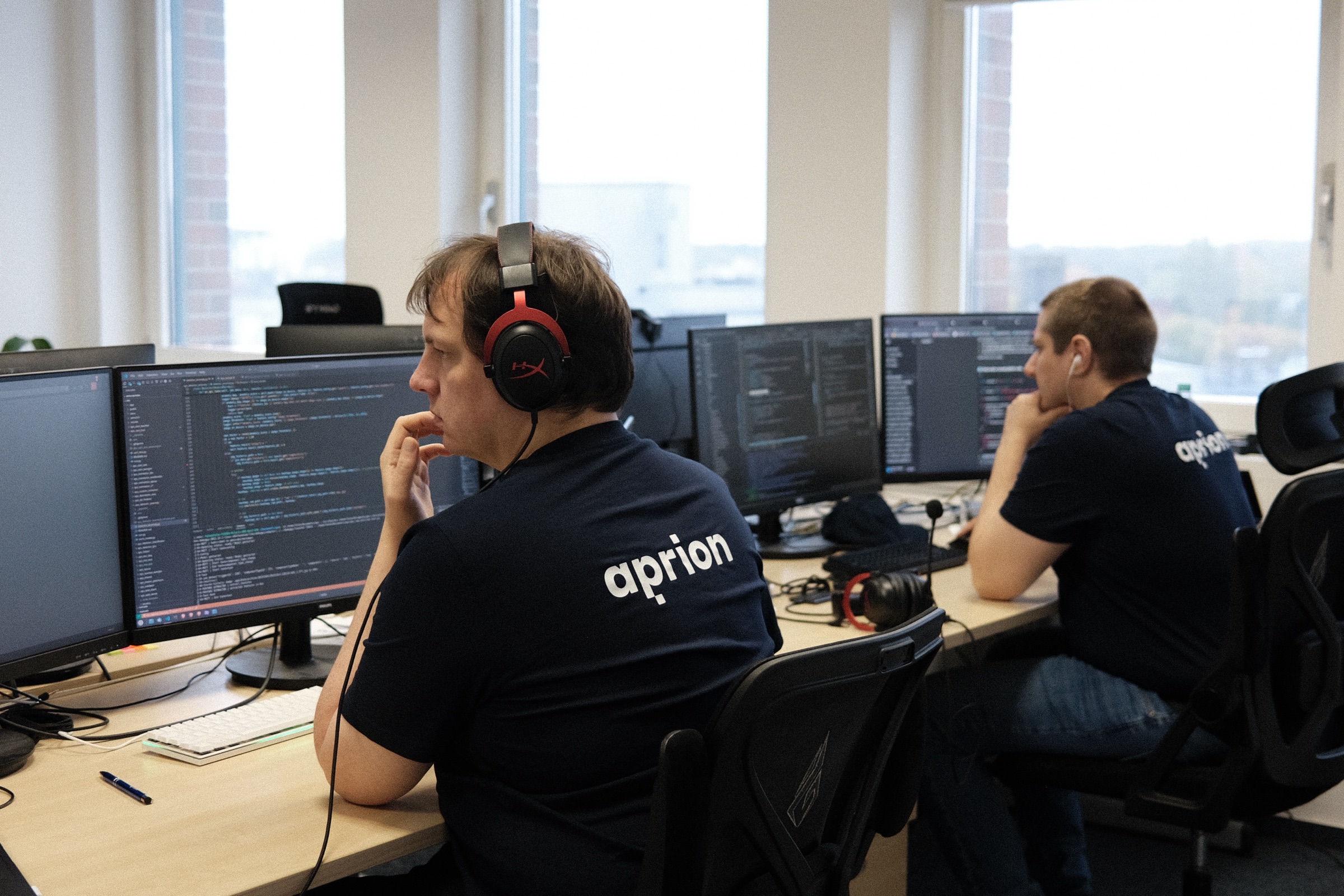 Aprion Entwicklerteam am Arbeitsplatz in Berlin