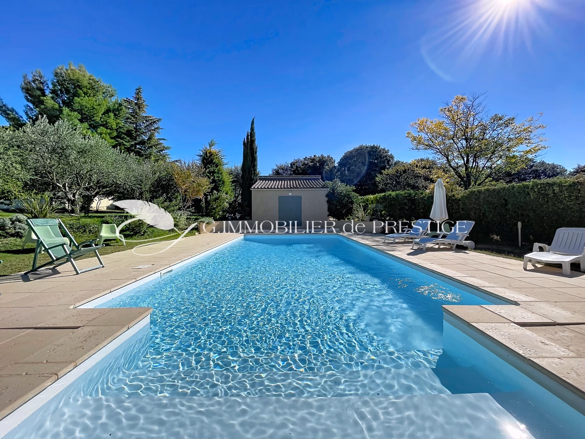 A stunning architect-designed villa with a sun-drenched pool