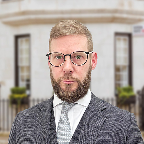 Portrait of Benjamin Wells, Partner at 'Belgravia Law', London.