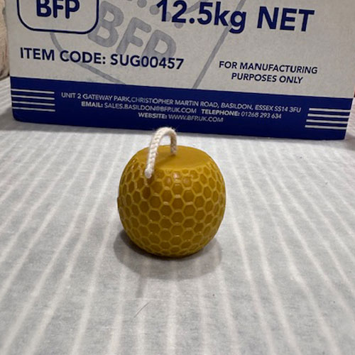 Elegant and earthy, this sleek Globe Beeswax Candle offers a perfect mix of natural beauty and warm minimalism to any room. 