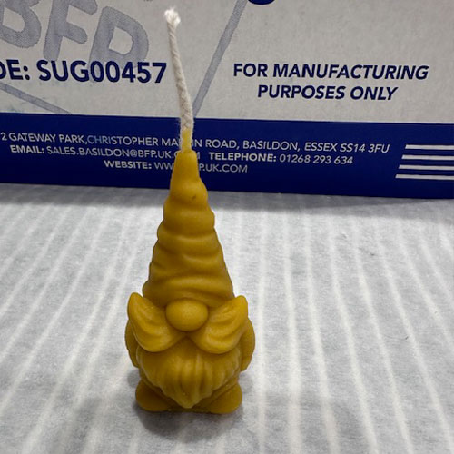 Bring a splash of Nordic magic to your seasonal decorations with this charming Gonk 1 Beeswax Candle. With its warm golden hue and subtle honey scent, it'll spread sweetness all around your home. 