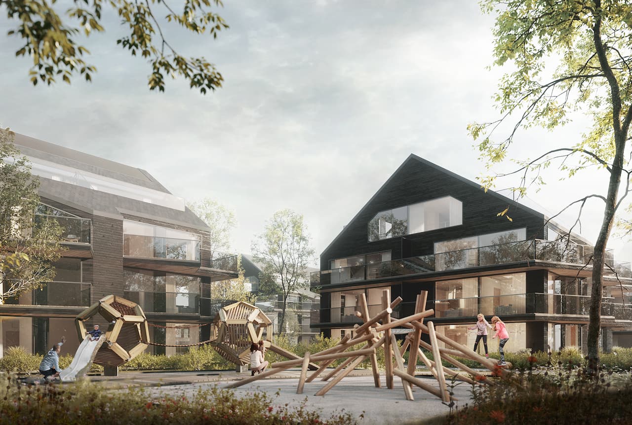 Widok apartamentowca w Białorzegach, widac budynek nowoczesnej architekturze, przeszklenia gwarantujace naturalne swiatło, a także infrastrukturę w postaci placu zabaw dla dzieci