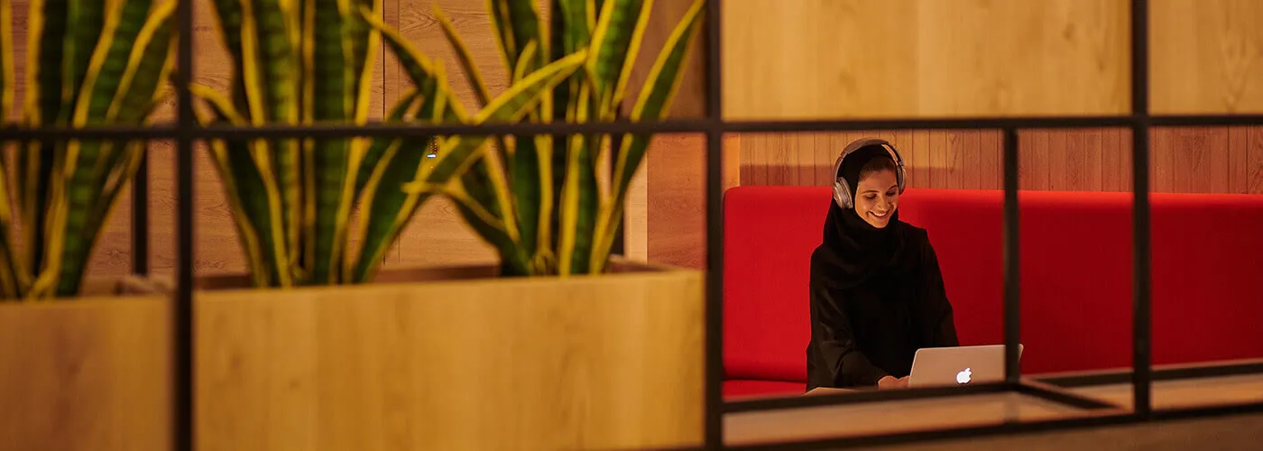 woman with headset smiling