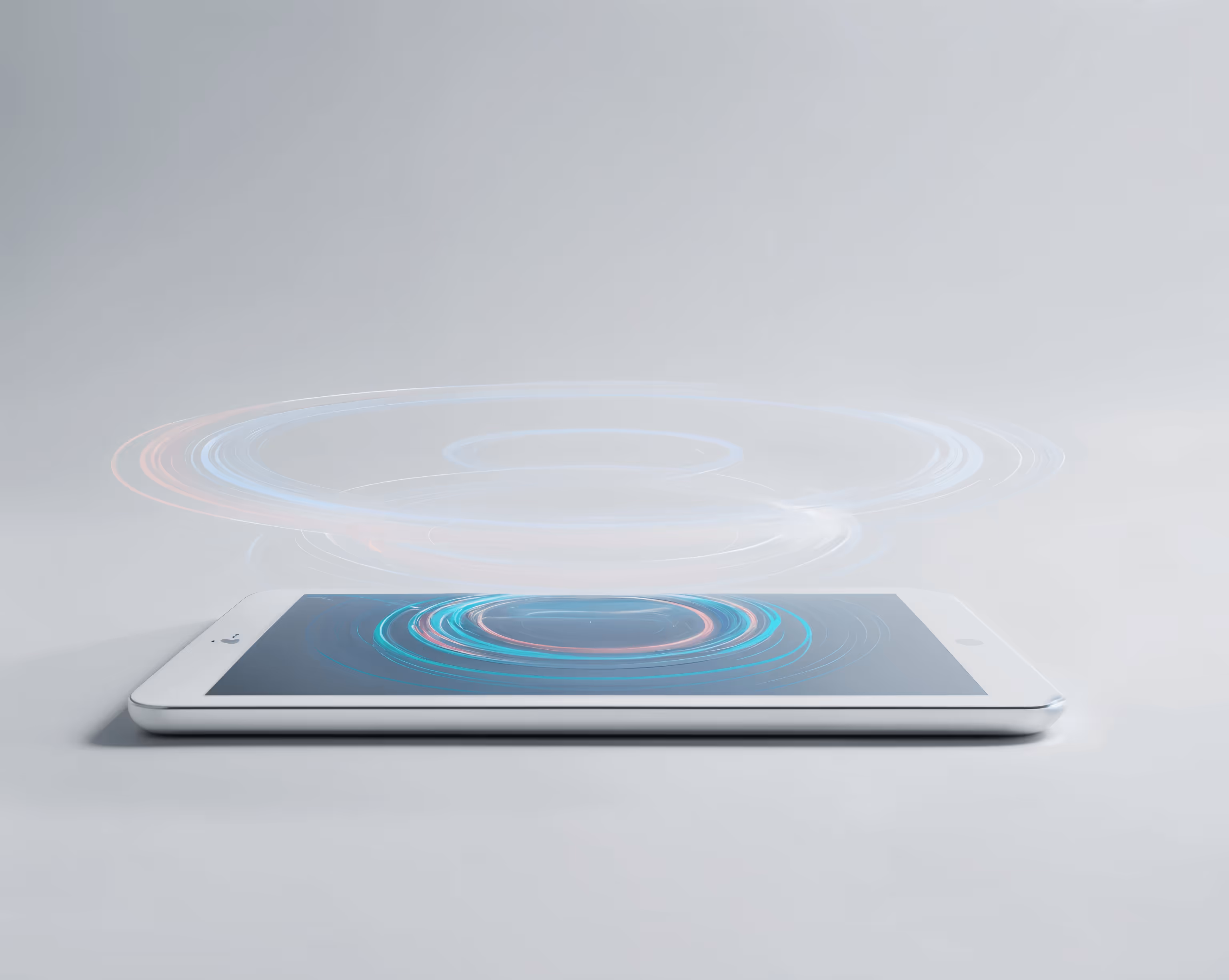A tablet sat in a minimalist clean setting with an upside-down digital whirlpool of transformative flow powering from its centre