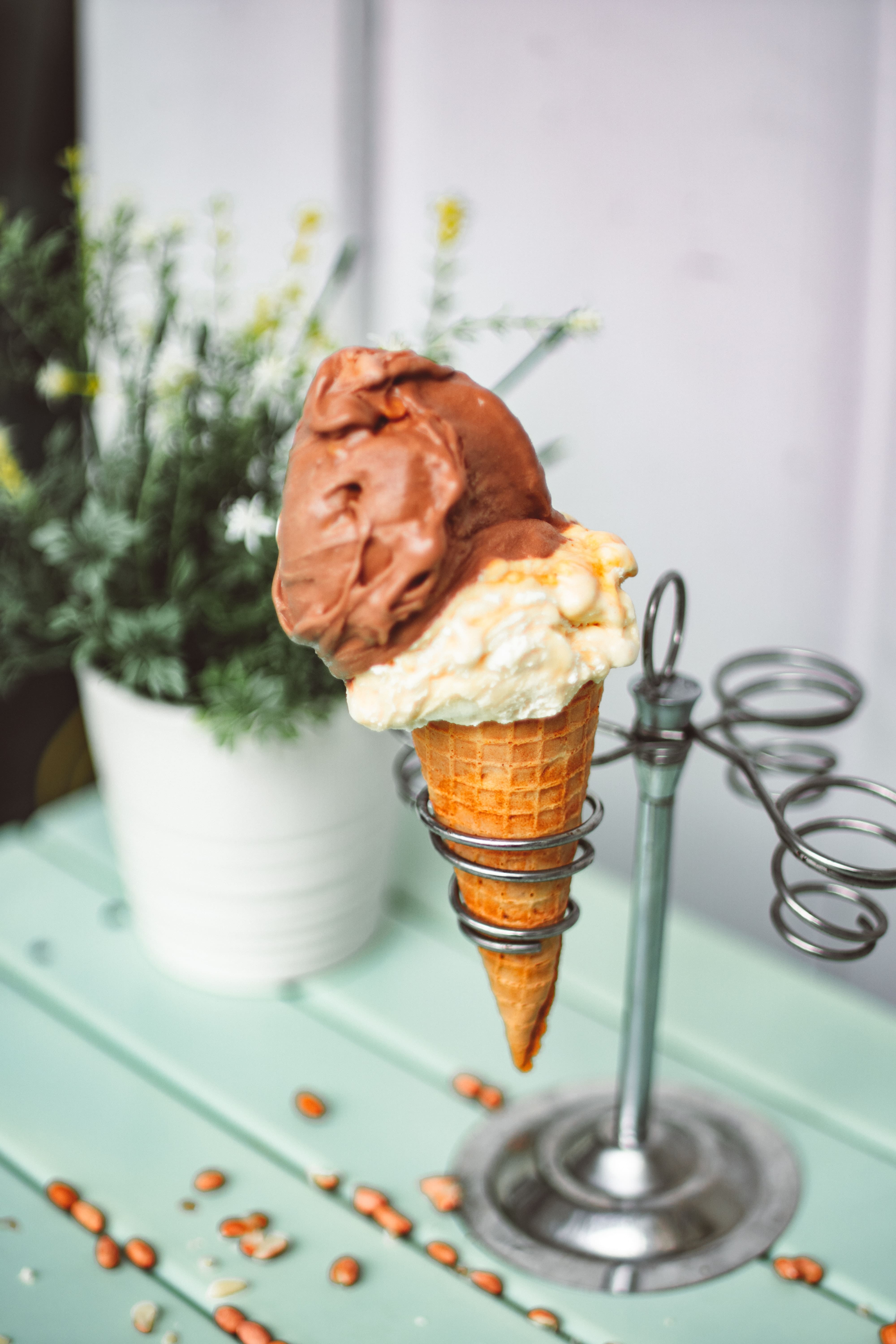 Two scoops of soothing vanilla and chocolate ice cream, one of the recommended soft foods after wisdom teeth extraction