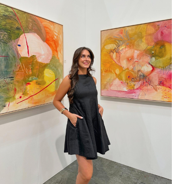 Liza at an art exhibition