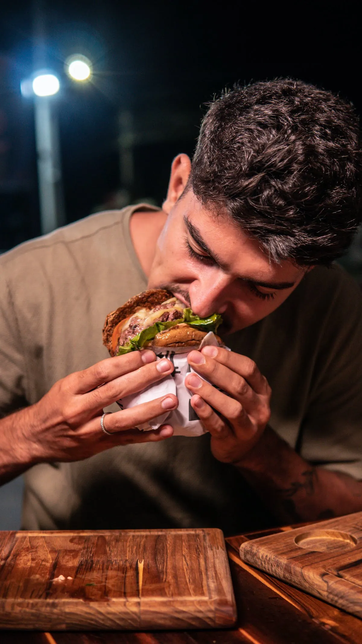 A customer eating a burger