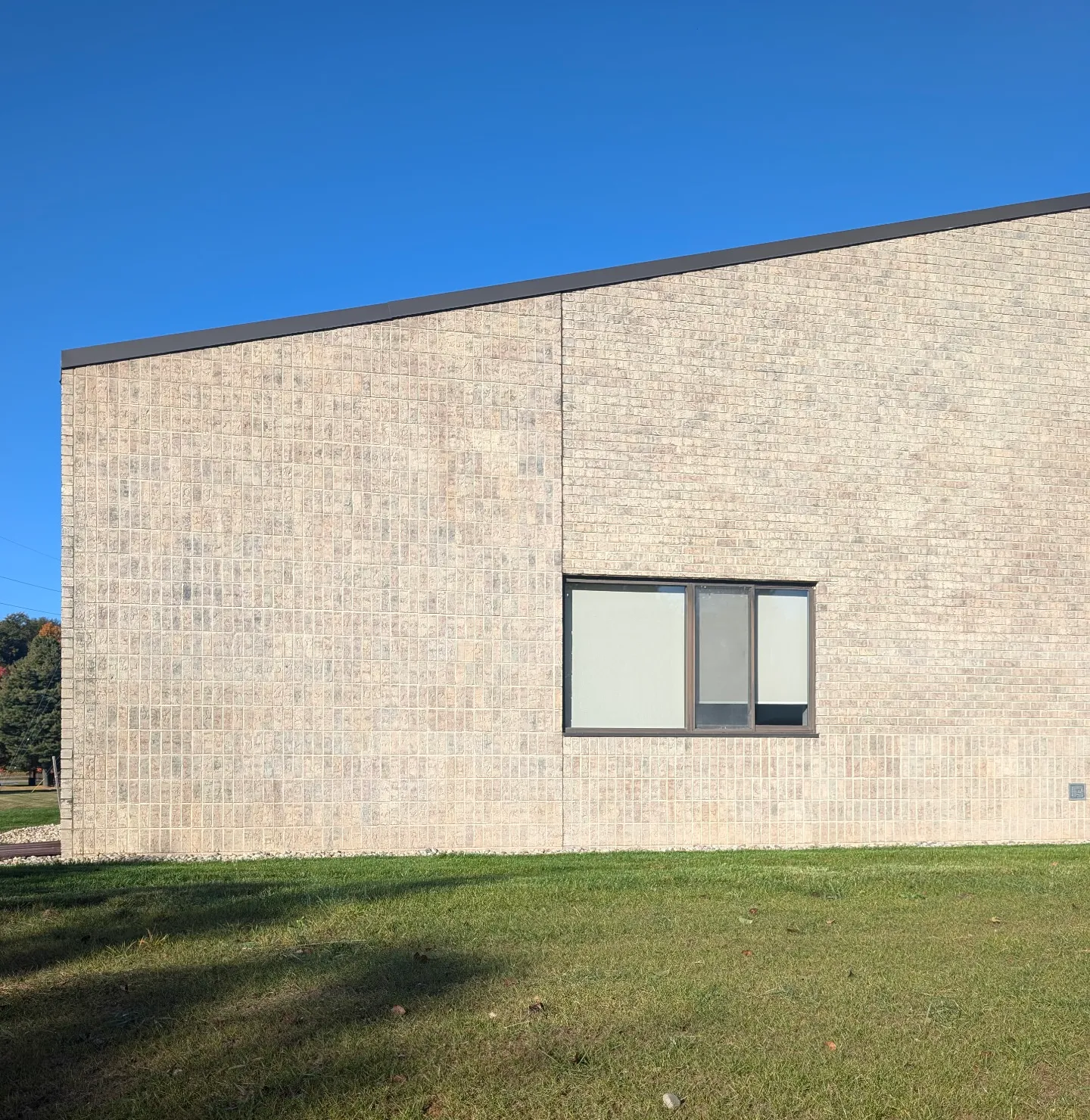 Lime wash on a commercial building in michigan
