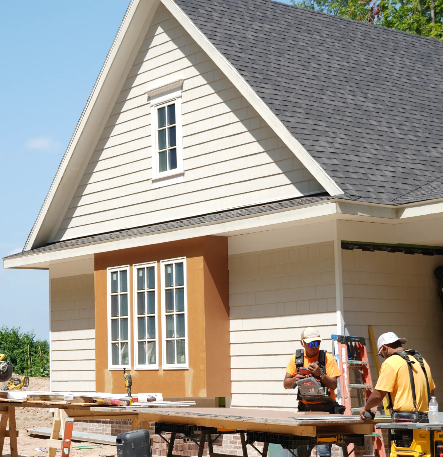 Ophoff Company employees working on a residential siding project in Michigan.