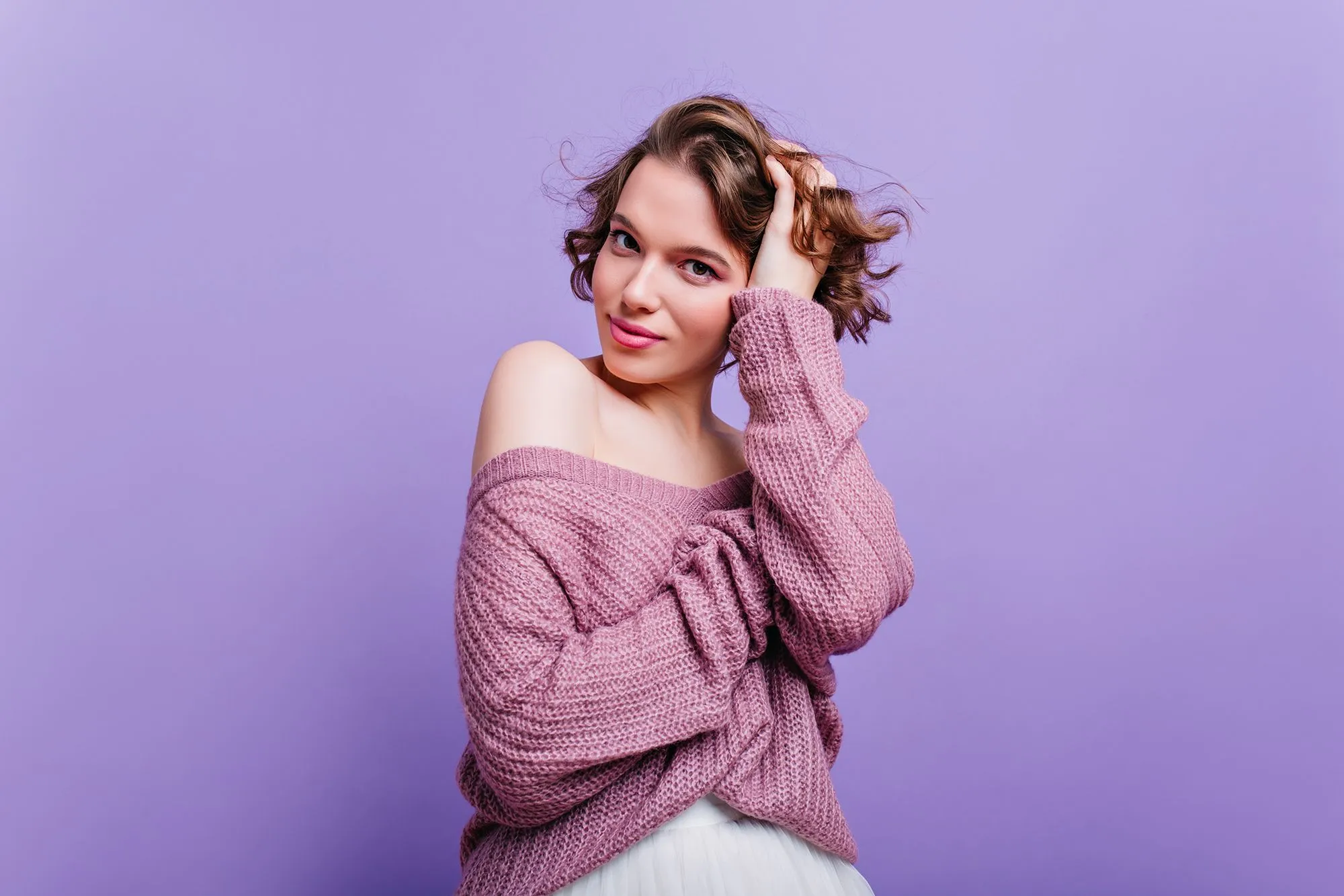 Cute girl on a purple background