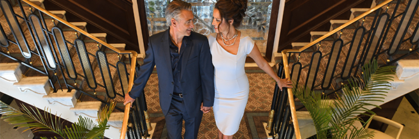 Couple on an elegant ship staircase