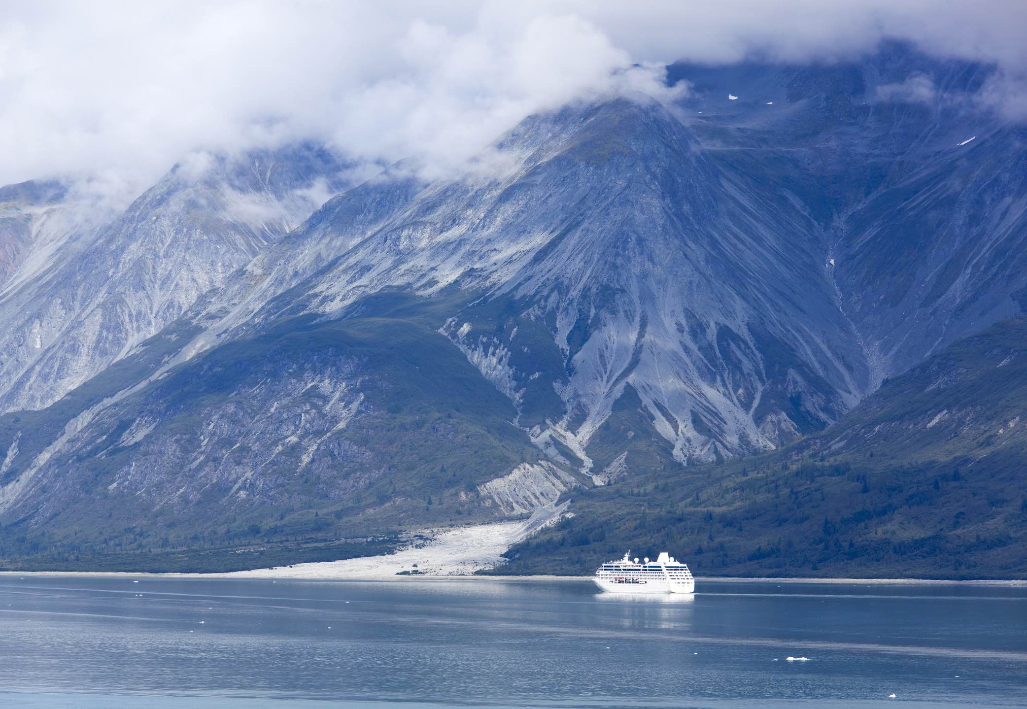 The view of a cruise liner exploring Glacier Bay national park (Alaska)