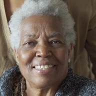A close up of a person wearing a jacket.