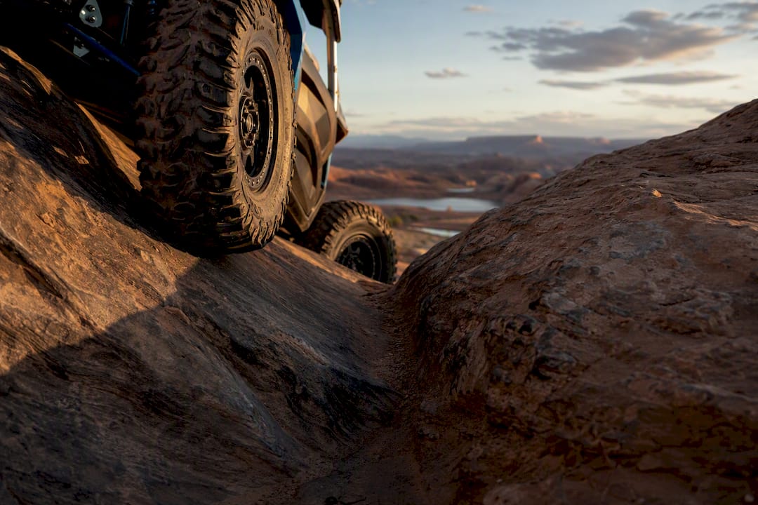 UTV climbing slickrock on Hell's Revenge trail