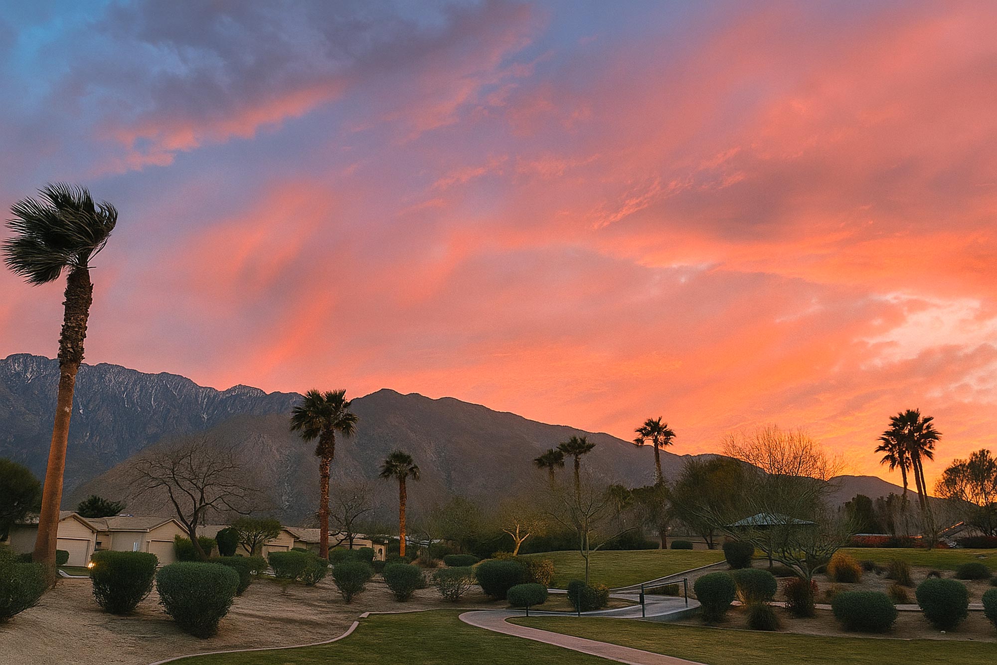 Beautiful sunset over the mountains along the neighborhood of the Tropical Villa in Palm Springs, California