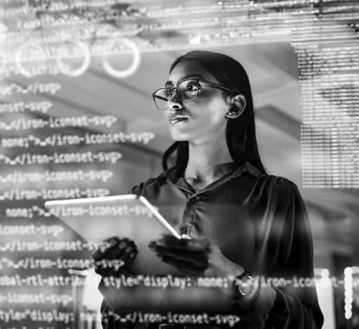 A woman with a tablet on her hands observing data in a screen