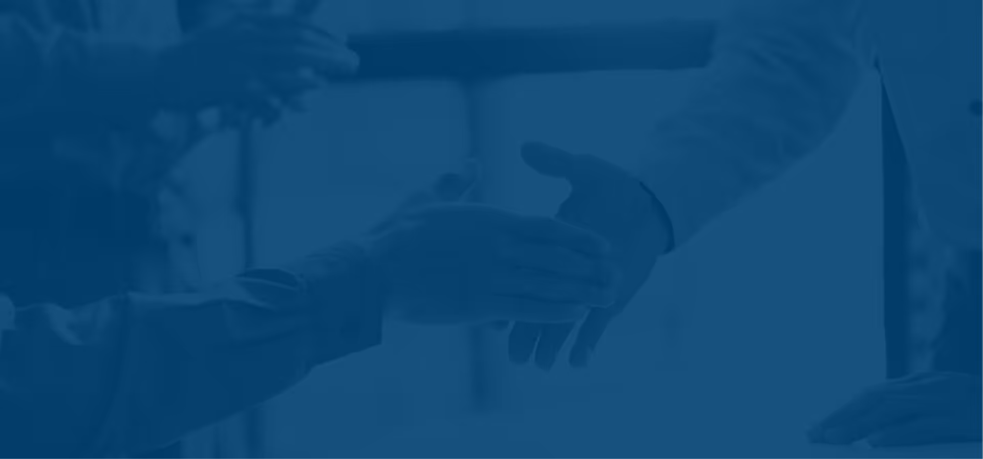 A photo of a handshake sealing a deal