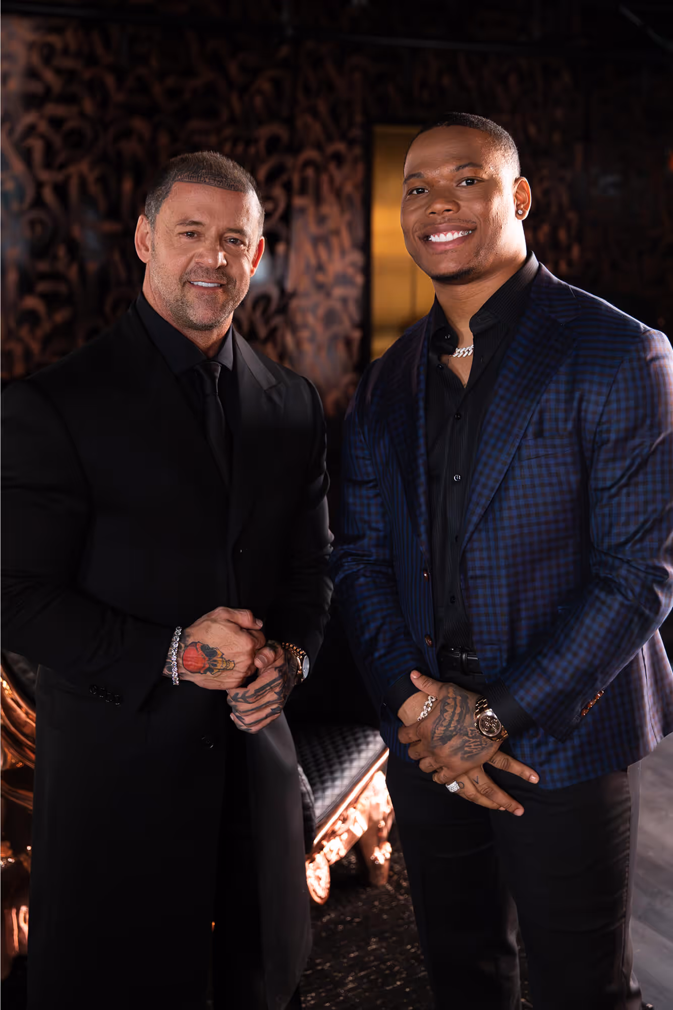 A couple of men standing next to each other.