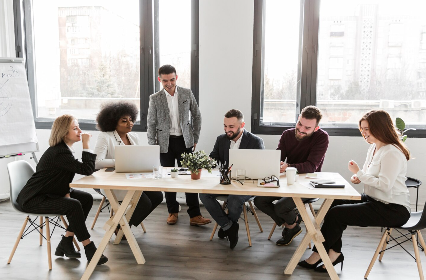 A team of professionals in a meeting room