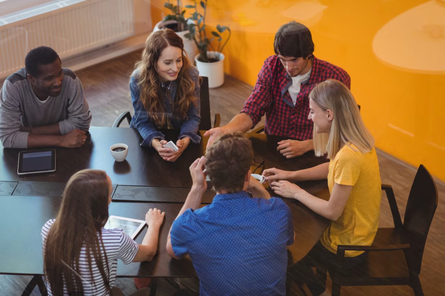 Healthcare team meeting with a digital marketing agency to plan compliant strategies on how to increase admissions